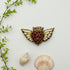 Broche cœur ailé brodée main – bijou artisanal perles et fils métalliques – Tawus