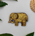 Broche éléphant brodée main – bijou artisanal éléphant Afrique Asie sagesse porte-bonheur perles et fils gris dorés – Tawus
