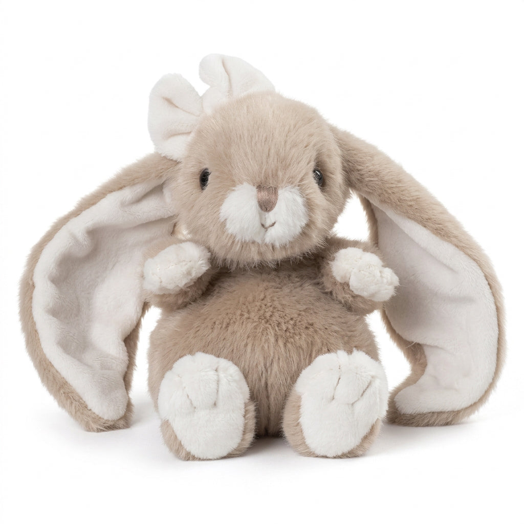  Peluche lapin Cute Kanina taupe de Bukowski Design, avec de longues oreilles, un nœud blanc et des pattes blanches, sur fond blanc.