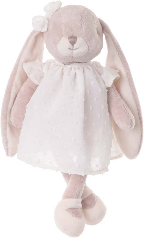 Peluche lapin rose Léna de Bukowski Design, jambes croisées, portant une robe blanche et un nœud sur l’oreille.